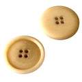 Knopf beige, 4 Loecher; Rueckseite mit vertiefter Mulde, Vorderseite glatt gewoelbt