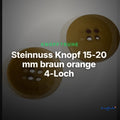 Steinnuss Knopf 15-20 mm braun orange 4-Loch mit Rand mit klassischem Schrift-Detail – Clean Showcase