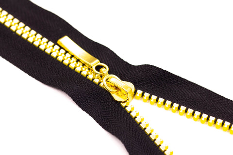 Schmuck Reißverschluss schwarz mit gold Zähnchen